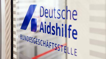 Glast&uuml;r mit Logo 